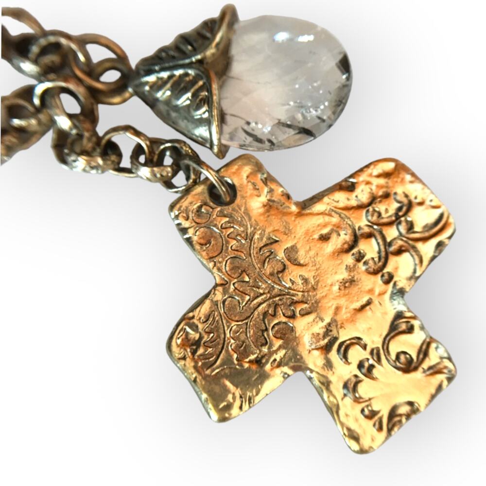Brass tone front clasp cross and crystal statement necklace
